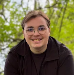 A headshot of Michael